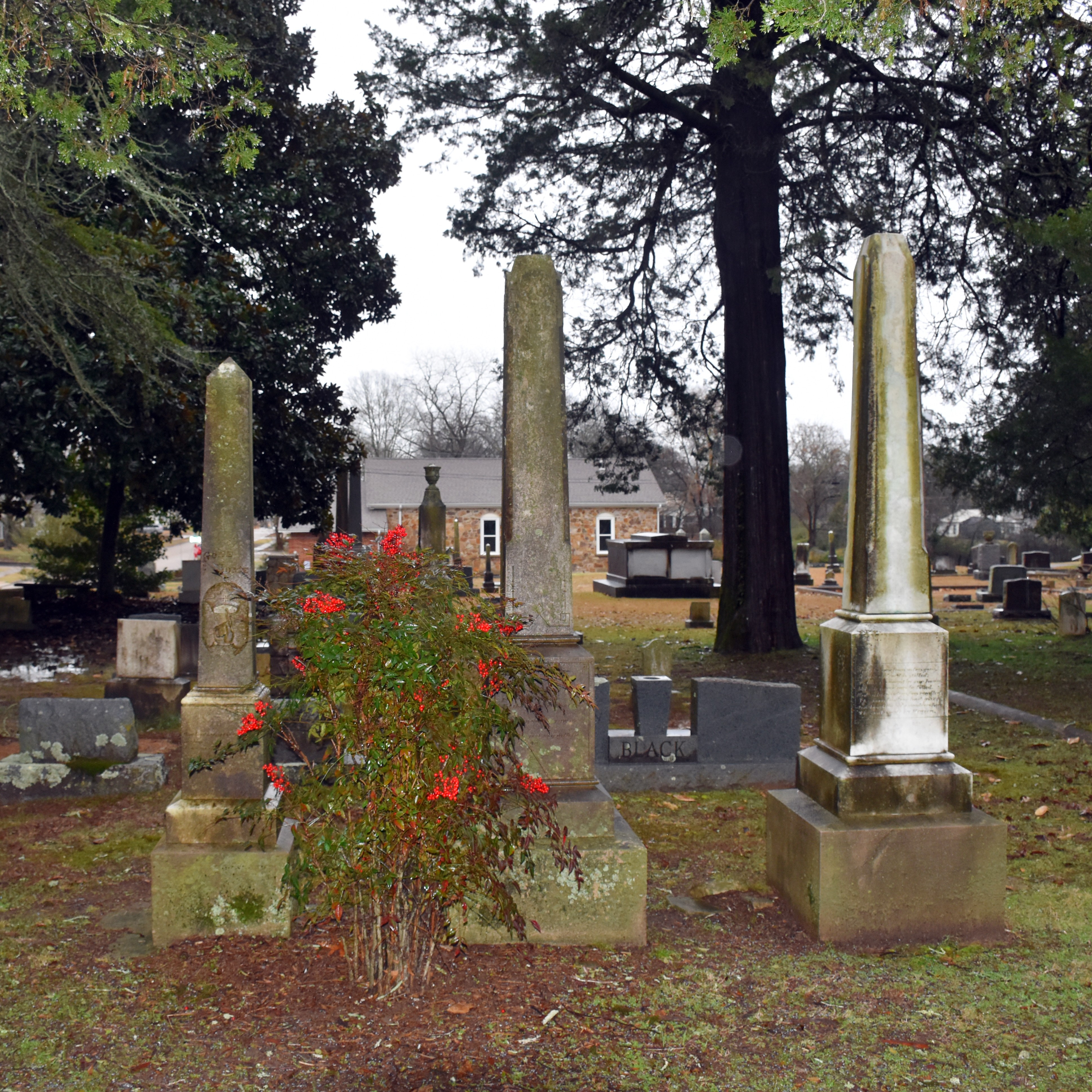 Three obelisk cemetery monuments at Rose Hill Cemetery in Arkadelphia